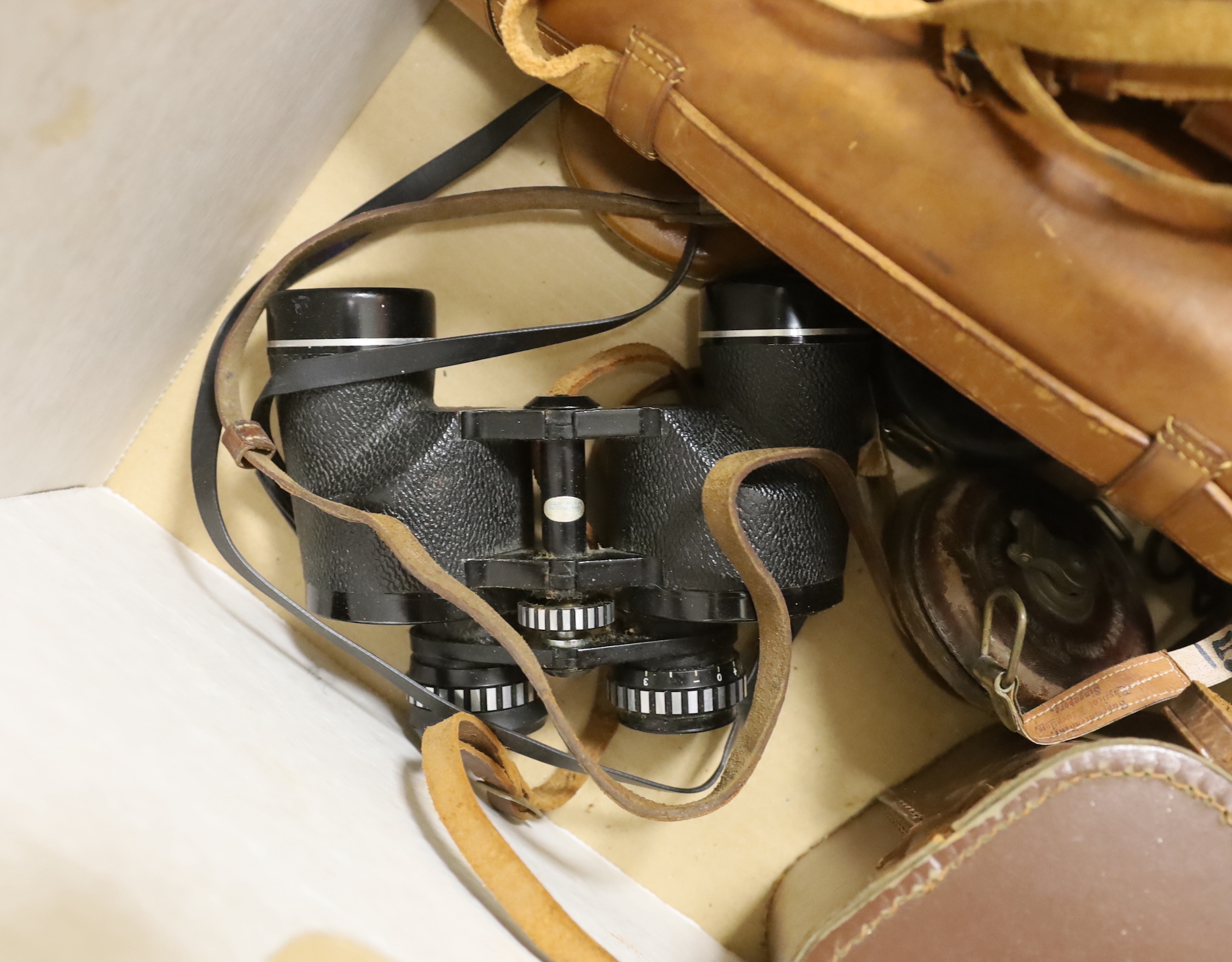 Mixed leather cased instruments, two pairs of binoculars, cameras etc